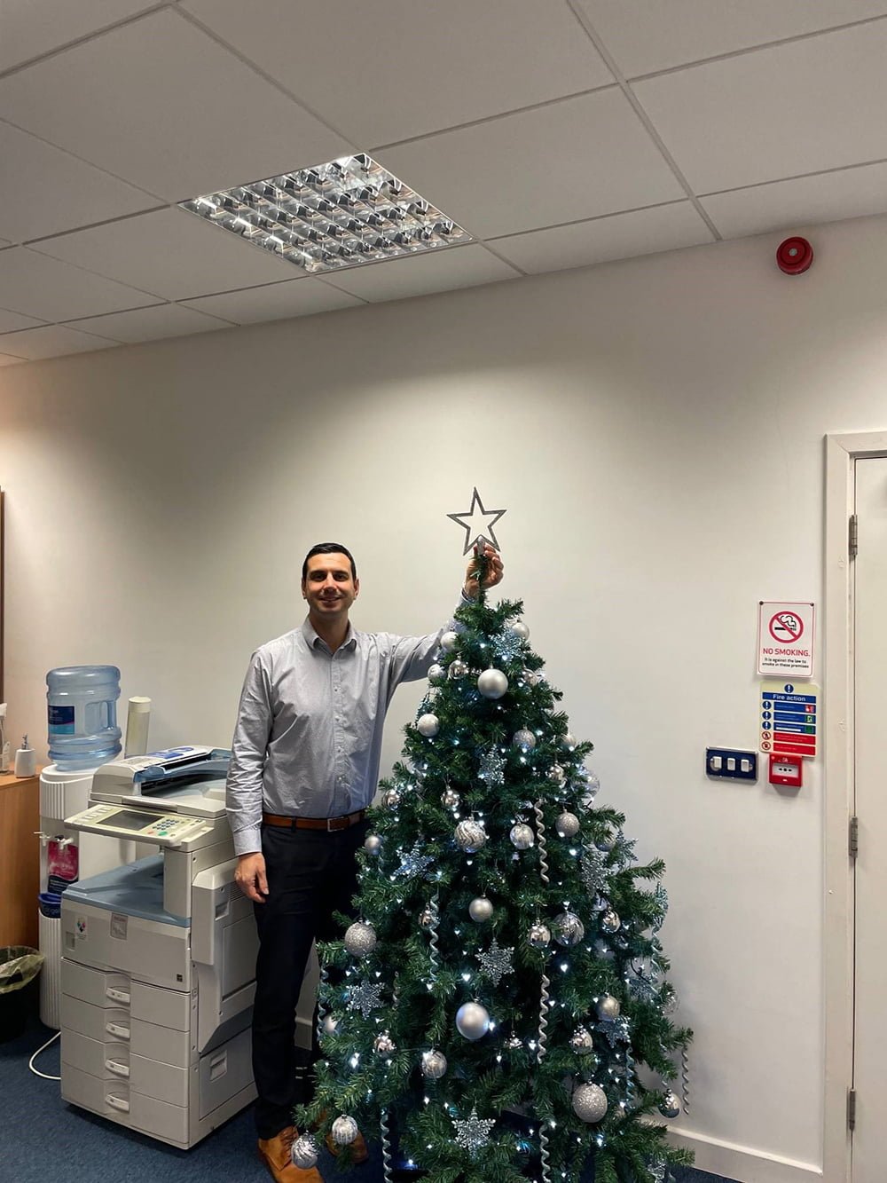 Partner, Martin Williams, adding the finishing touch to Letchworth's tree!